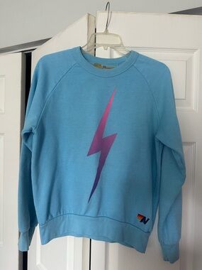 Aviator Nation Blue Sweatshirt with Pink-Purple Lightning Bolt
